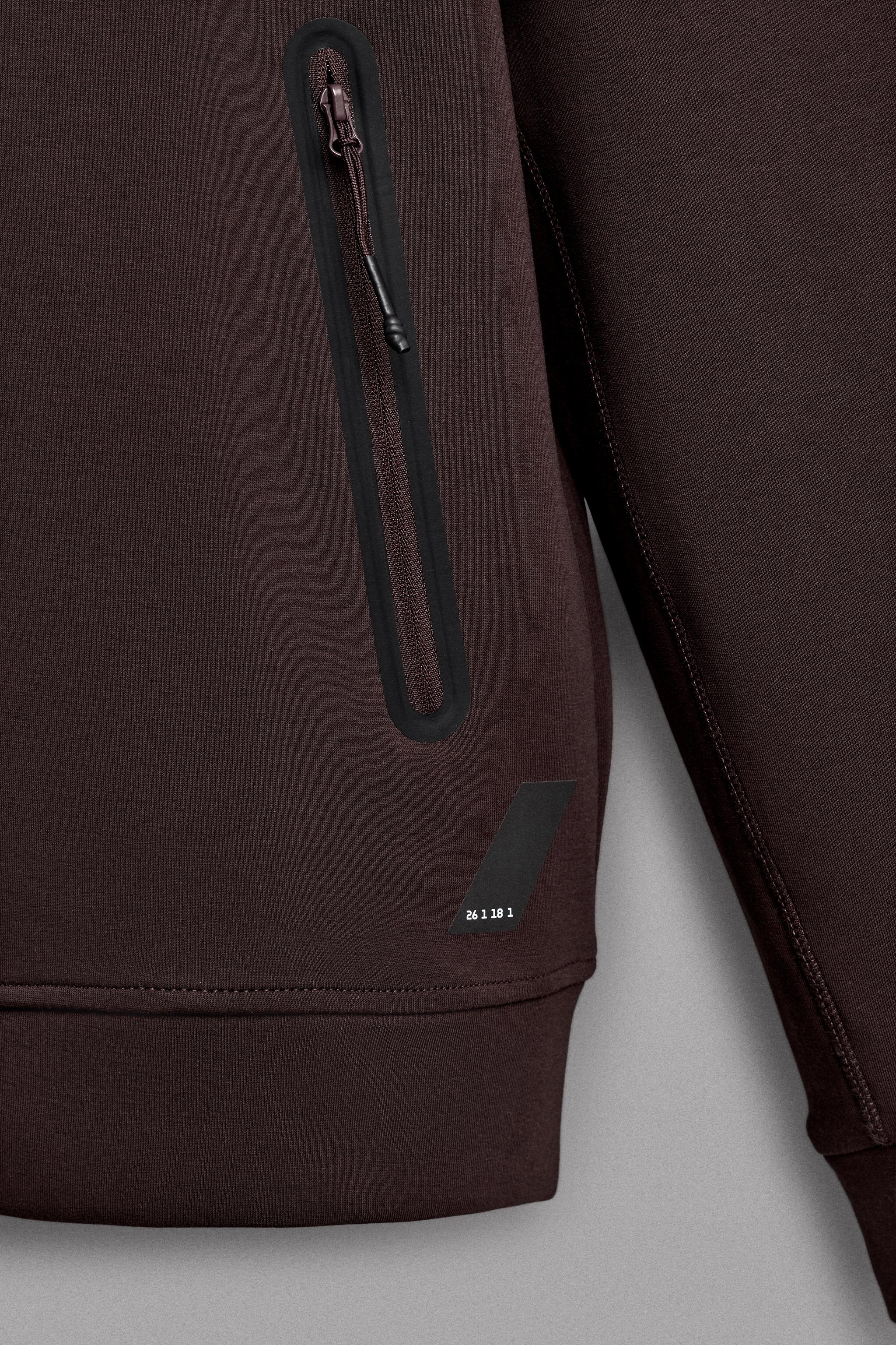 SWEAT TECHNIQUE ZIPPÉ À CAPUCHE